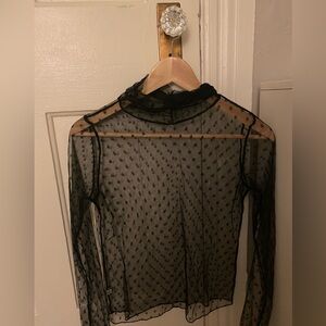 Polka dot mesh turtleneck